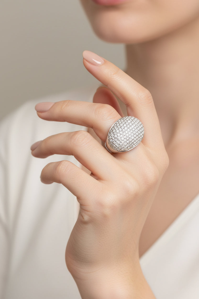 ANELLO BOMBATO OVALE CON PAVE DI ZIRCONI -ACCIAIO 316L