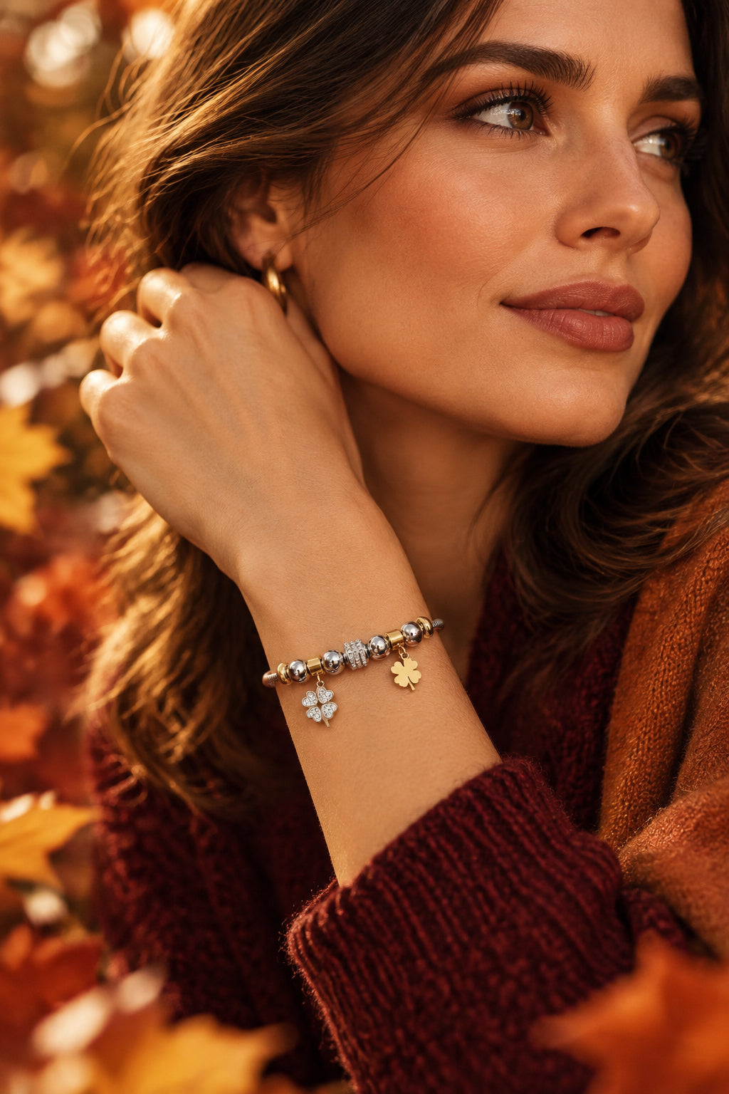 BRACCIALE CON CHARMS DORATI QUADRIFOGLIO -ACCIAIO INOX 316 L+STRASS