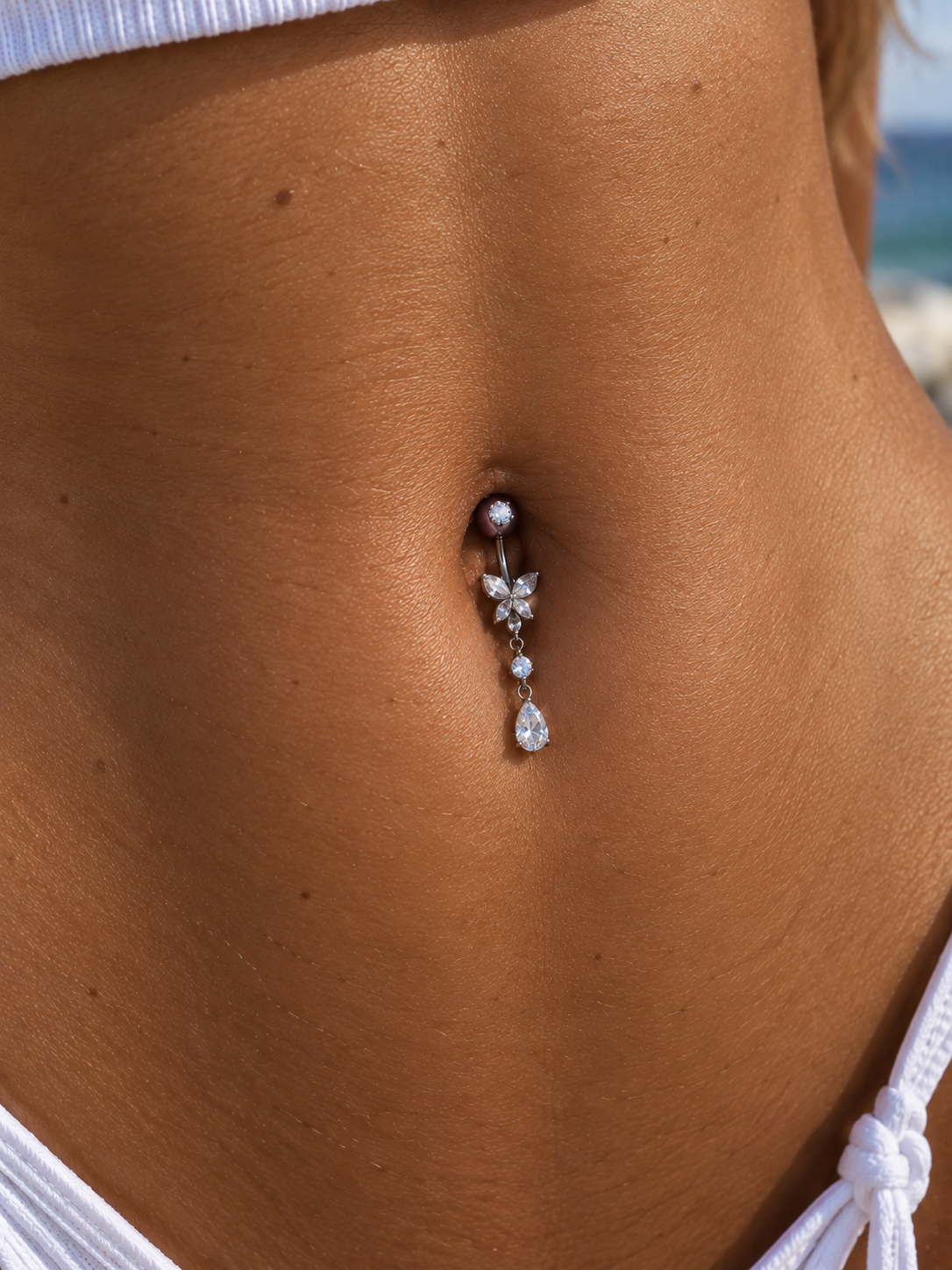 PIERCING DA OMBELLICO IN TIATINIO CON PENDENTE GRADO IMPLEMENTARE (ASTM F 136)