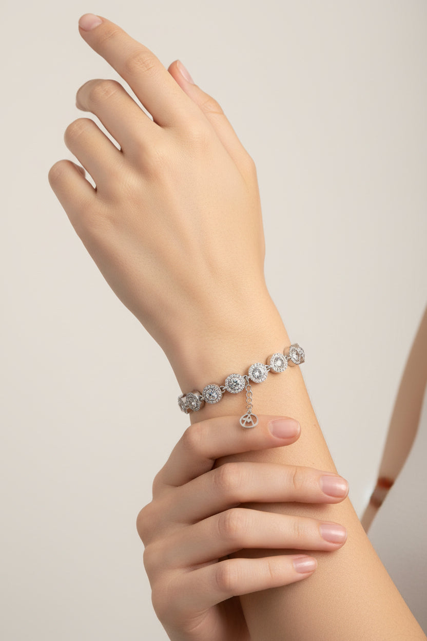 BRACCIALE CON ZIRCONI ROTONDI COLORATI ARGENTO ACCIAIO 316L