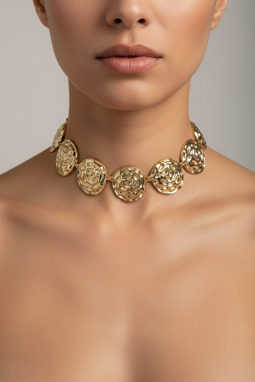 COLLANA STATEMENT CON TONDI MARTELLATI ACCIAIO 316L